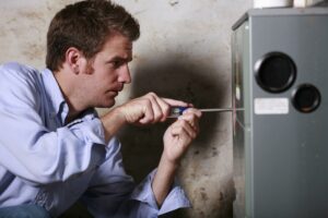 technician-working-on-furnace